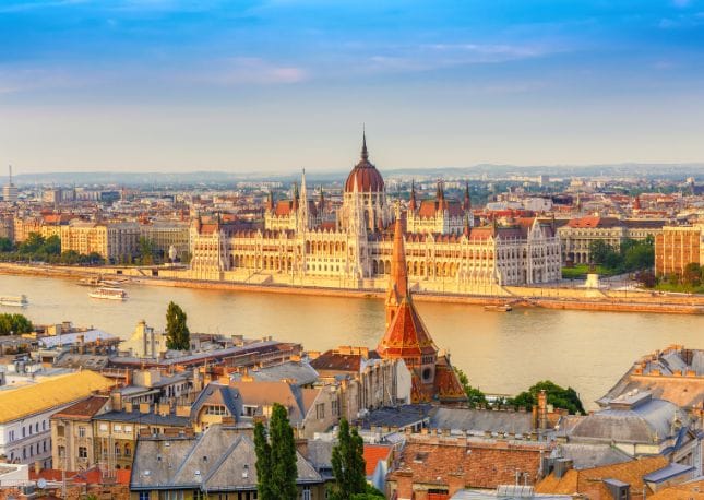 Photo of Danube river with parliament in the background