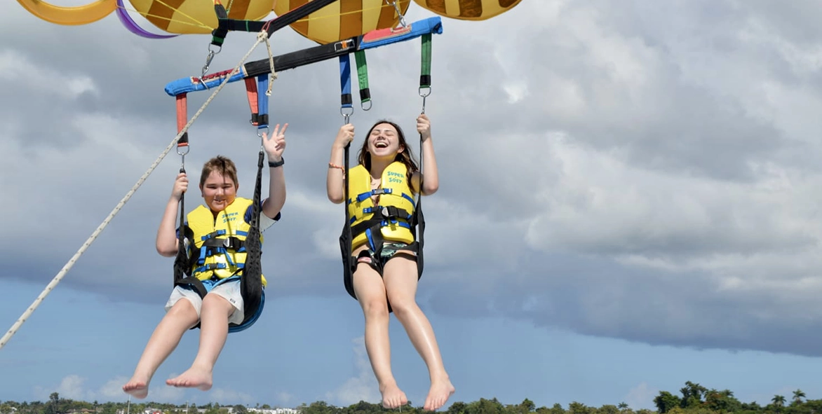 Adriana's kids parasailing.