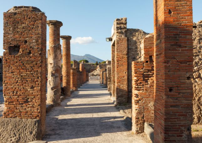 Walk in the shadow of Vesuvius on a shore excursion to uncover the hauntingly beautiful remains of Pompeii and Herculaneum, two cities lost—and preserved—by one of history’s most powerful natural disasters.