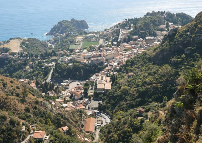 Soak up the splendor of Castelmola, an enchanting village near Taormina with deep roots in the ancient past. Stroll the labyrinth of charming streets that wind around the picturesque Piazza del Duomo where enjoy glorious views of Mount Etna and the beaches