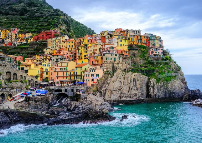 Belvedere, Cinque Terre, a national park and territory protected by UNESCO, is known for its dramatic scenery, which you'll admire as you journey through three lovely villages.