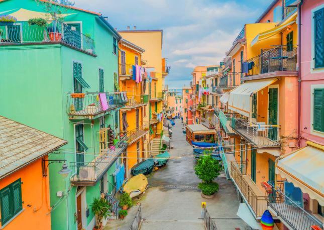 Explore Vernazza, one of the smallest villages in Cinque Terre, nestled in the rocky coastline