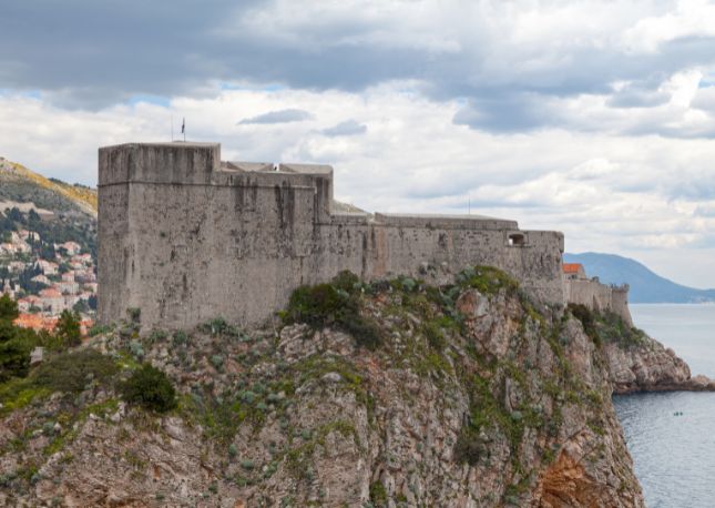Your day begins with a scenic drive to Pile Gate, the entry to this 1,400-year-old UNESCO World Heritage site. From Pile Square, walk to Fort Lovrijenac, perched on a 121-foot cliff with views over the Adriatic and famed as a filming location.