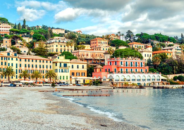 Continue to the resort and fishing town of Santa Margherita, which features a palm-laden harbor shared by both rustic fishing boats and luxurious yachts.