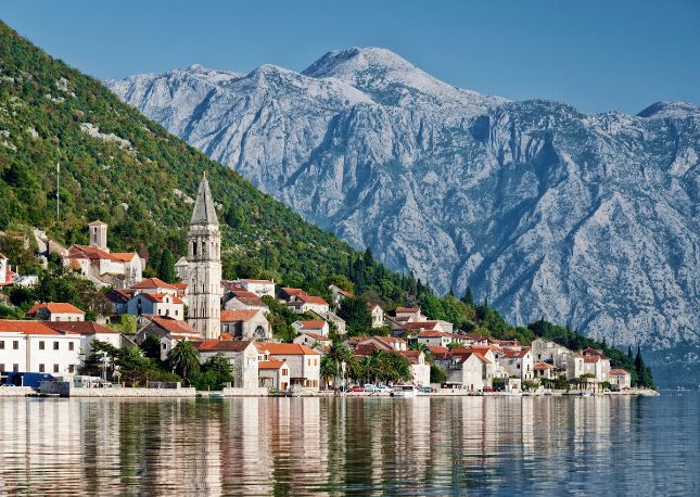 Discover some of the best scenery in Montenegro as you sail onboard a catamaran around Boka Bay, arriving to a beach for free time to swim and sun.